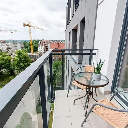 Center - Aura By Apartmore *